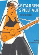 Gitarren spielt auf Heft 3 